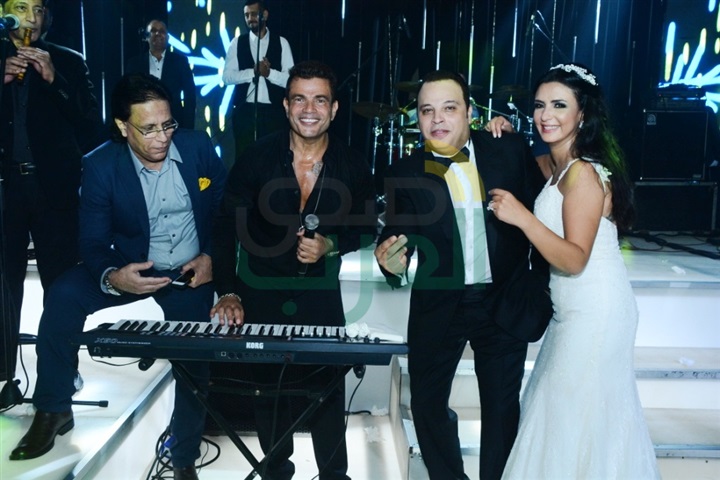 بالصور.. عمرو دياب يشعل حفل زفاف تامر عبد المنعم وأمنية الطوخي بالصور.. عمرو دياب يشعل حفل زفاف تامر عبد المنعم وأمنية الطوخي