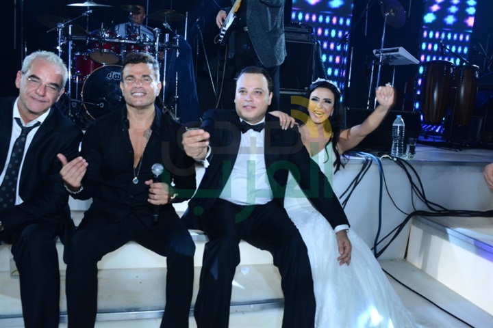 بالصور.. عمرو دياب يشعل حفل زفاف تامر عبد المنعم وأمنية الطوخي بالصور.. عمرو دياب يشعل حفل زفاف تامر عبد المنعم وأمنية الطوخي