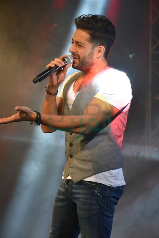 بالصور.. ‎محمد حماقي يشغل حفل الجامعه الامريكيه