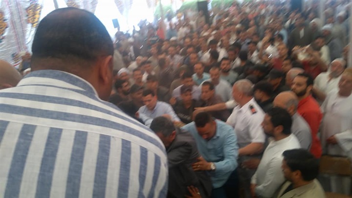 بالصور.. كفن ودية ينهيان خصومة ثأرية بين عائلتين بالبدرشين بحضور أمنى مكثف