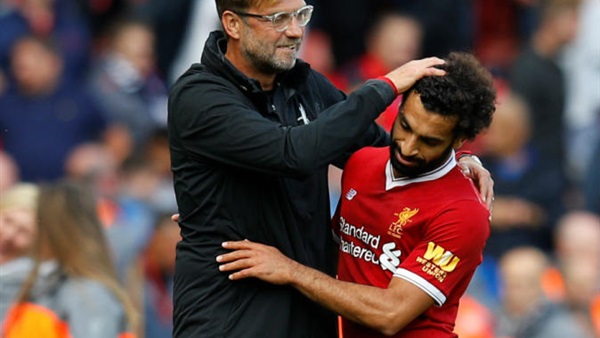 صلاح ومدرب ليفربول-