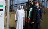 بالصور.. مريم الكعبي ترفع علم  دولة الامارات احتفالا بيوم العلم