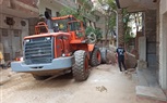 محافظة الجيزة تعيد فتح شارع تخطيطى بحى العمرانية اغلقه سكان أحد العقارات بالأسوار