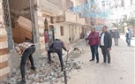 إيقاف أعمال تشطيب بدون تصريح وإزالة باب عقار وسلم مخالف لخط التنظيم بشارع الحلوانى من شارع جسر الكونيسه