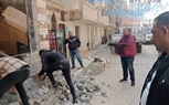 إيقاف أعمال تشطيب بدون تصريح وإزالة باب عقار وسلم مخالف لخط التنظيم بشارع الحلوانى من شارع جسر الكونيسه