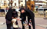 بالهدايا والورود .. الشرطة تشارك المواطنين الإحتفال بعيد الفطر المبارك