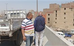 ايقاف اعمال بناء سور بدون ترخيص بجوار الطريق الدائري وتم هدم السور 