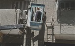صيانة وتأمين أعمدة الإنارة بشارع احمد الفيومى من شارع العشرين