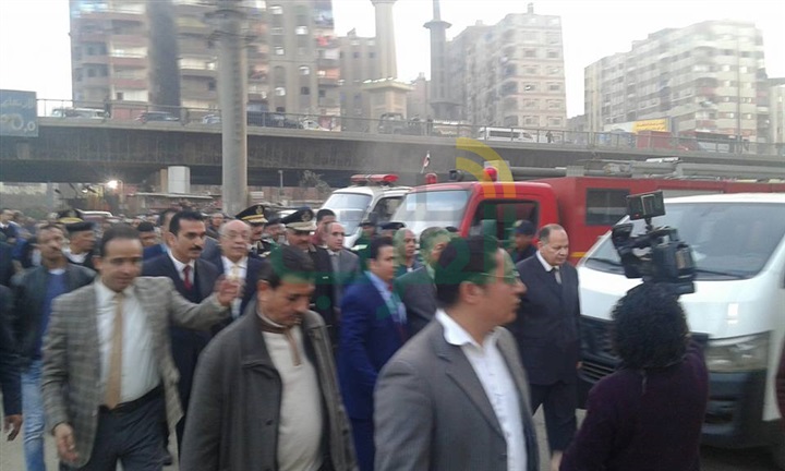 بالصور..  كفنان ينهيان خصومة ثأرية بالجيزة فى حراسة أمنية مشددة