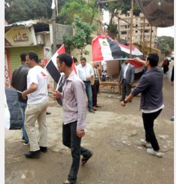 بالصور.. الحشود الشعبية بلجان عزبة النخل واحتفالات الناخبين بالعرس الديمقراطي